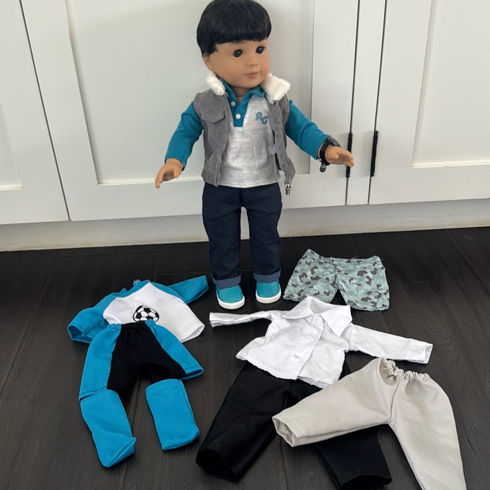 Original American Girl doll 18” Boy with added vest and outfits.